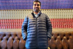 Kae Kae posing infront of Beer Can collection at Oxford